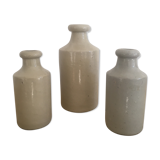 Three bottles of Mercure Bourdon Frères Paris sandstone