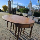 12-foot round oak table with 7 extensions / 20 people