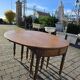 12-foot round oak table with 7 extensions / 20 people