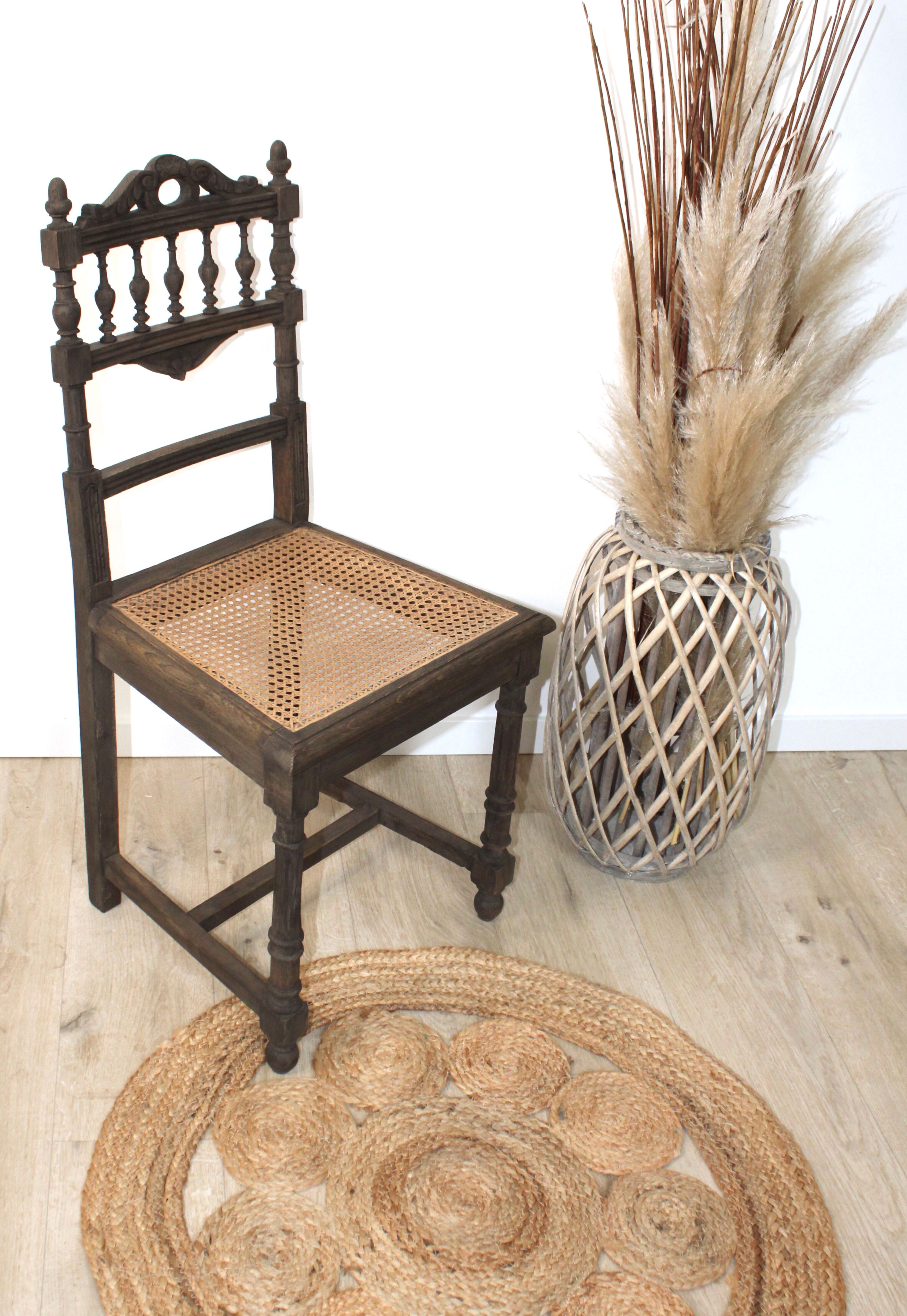 Old style ebony wooden chair