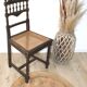 Old style ebony wooden chair