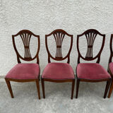 Set of 6 wooden chairs sitting red