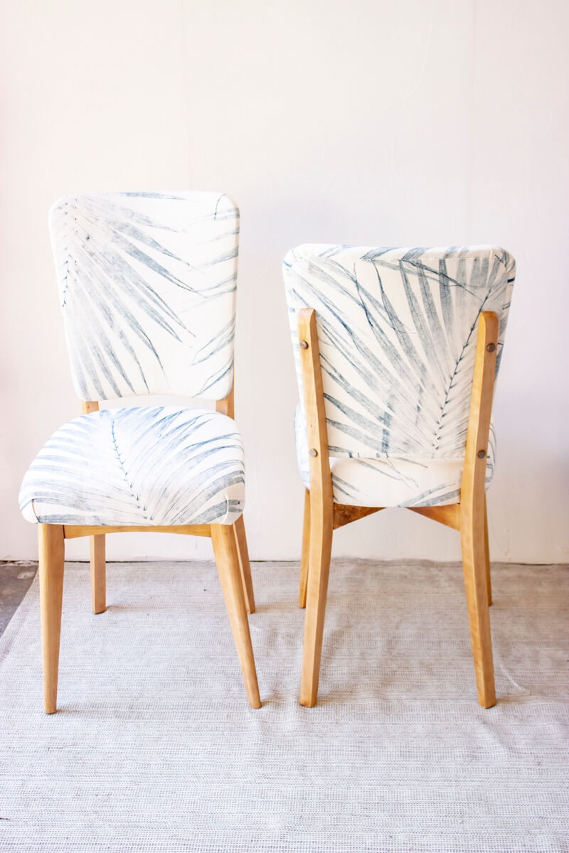 Pair of vintage chairs reupholstered with palm pattern fabric