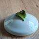 Porcelain jam pot with hand-painted plum design, signed sweet jar.