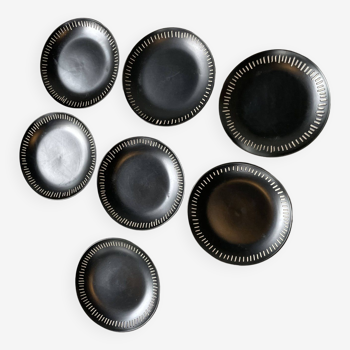 7 black ceramic plates