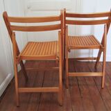 Pair of folding chairs with vintage solid wood slats