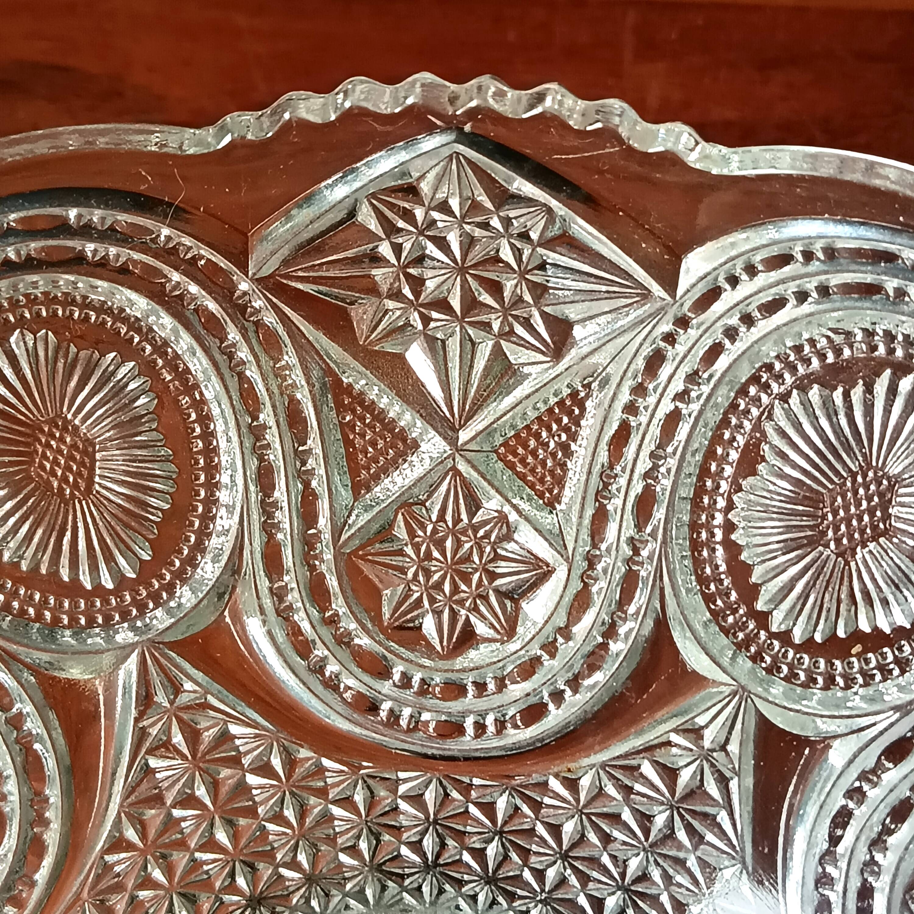 Transparent glass dish on vintage metal stand