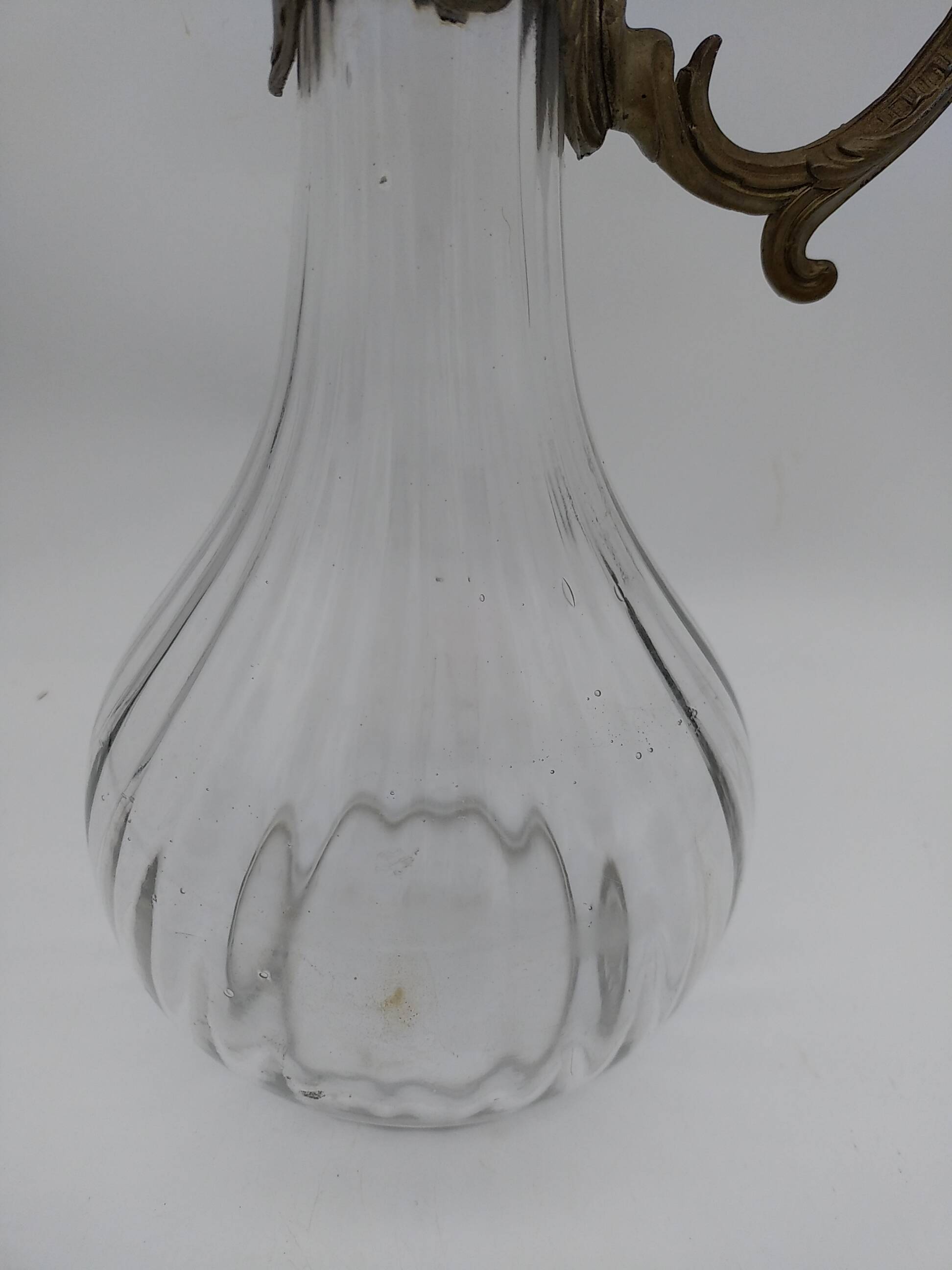 Large balloon glass carafe with pewter frame.