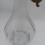 Large balloon glass carafe with pewter frame.