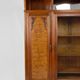 Art Deco showcase bookcase in carved walnut, France, circa 1925