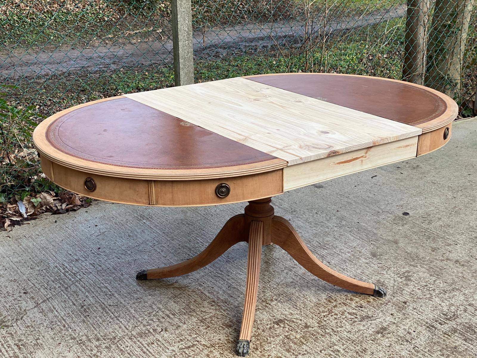 Round extendable table in Empire style, renovated with Bordeaux leather and raw wood, 168cm.