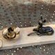 Table lamp, Biche, fawn in gilded brass on a beige marble base, art deco Velvet underside