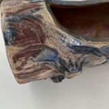 Lot of sandstone planter in the shape of logs