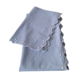 Embroidered drapery and baby's bed adornment