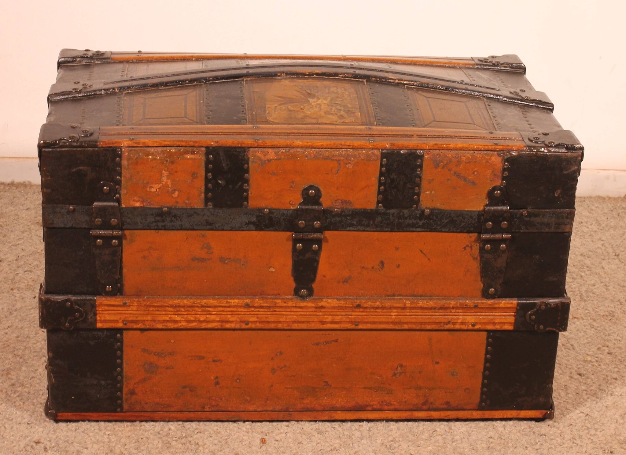 travel trunk from the early 20th century made of leather and wood