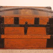 travel trunk from the early 20th century made of leather and wood