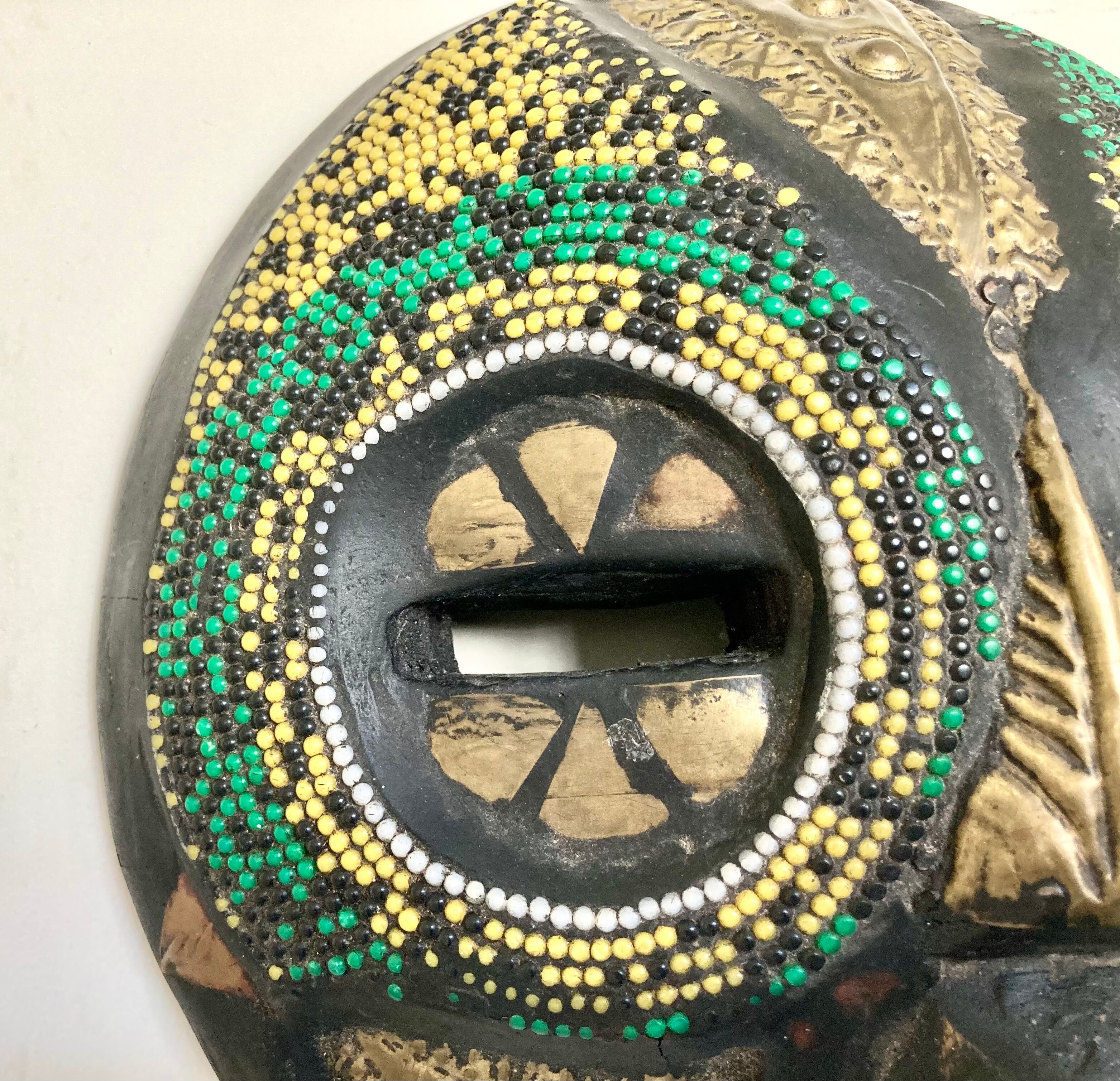Vintage mask in carved wood beads and copper metal