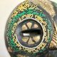 Vintage mask in carved wood beads and copper metal
