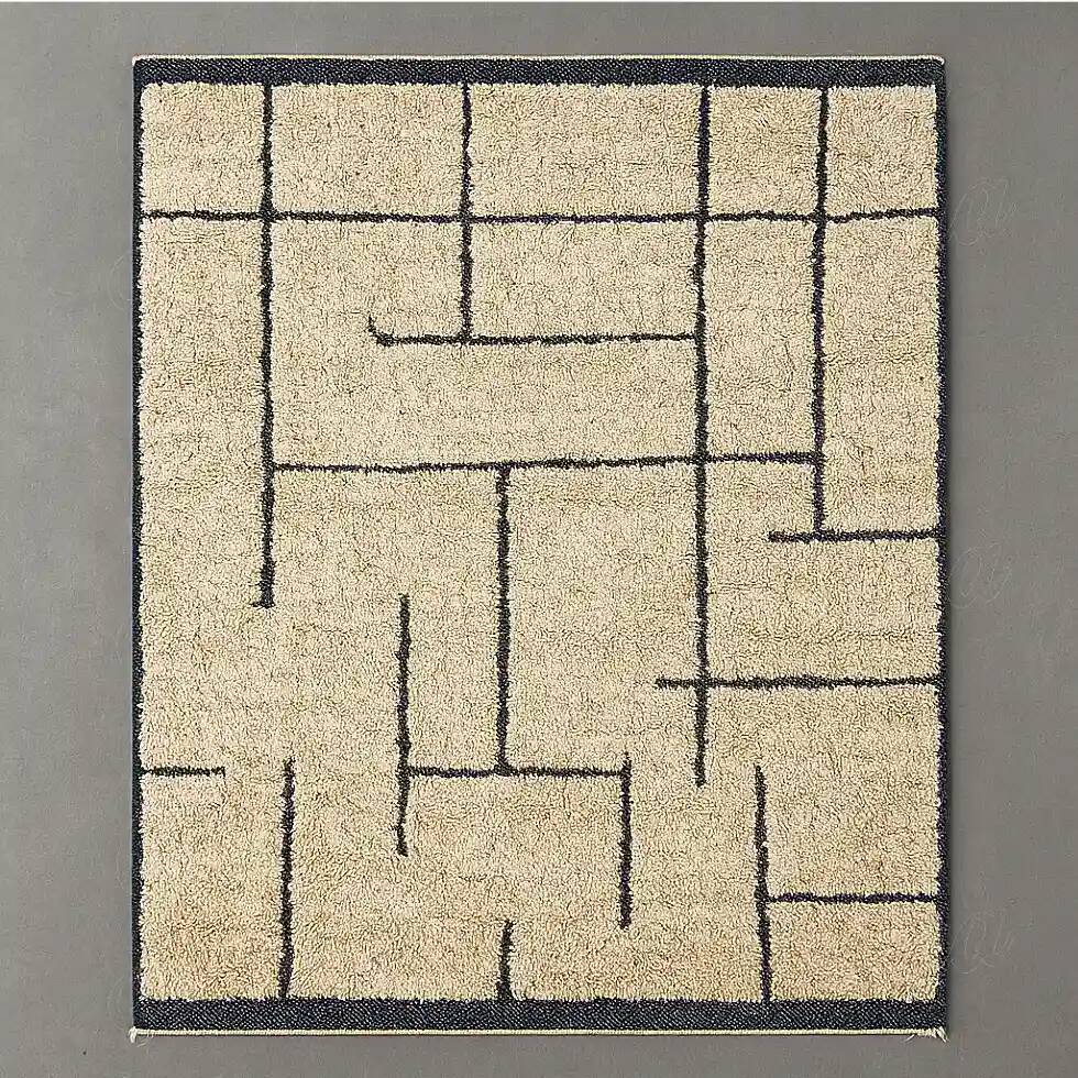 Beige Berber rug with structured lines.