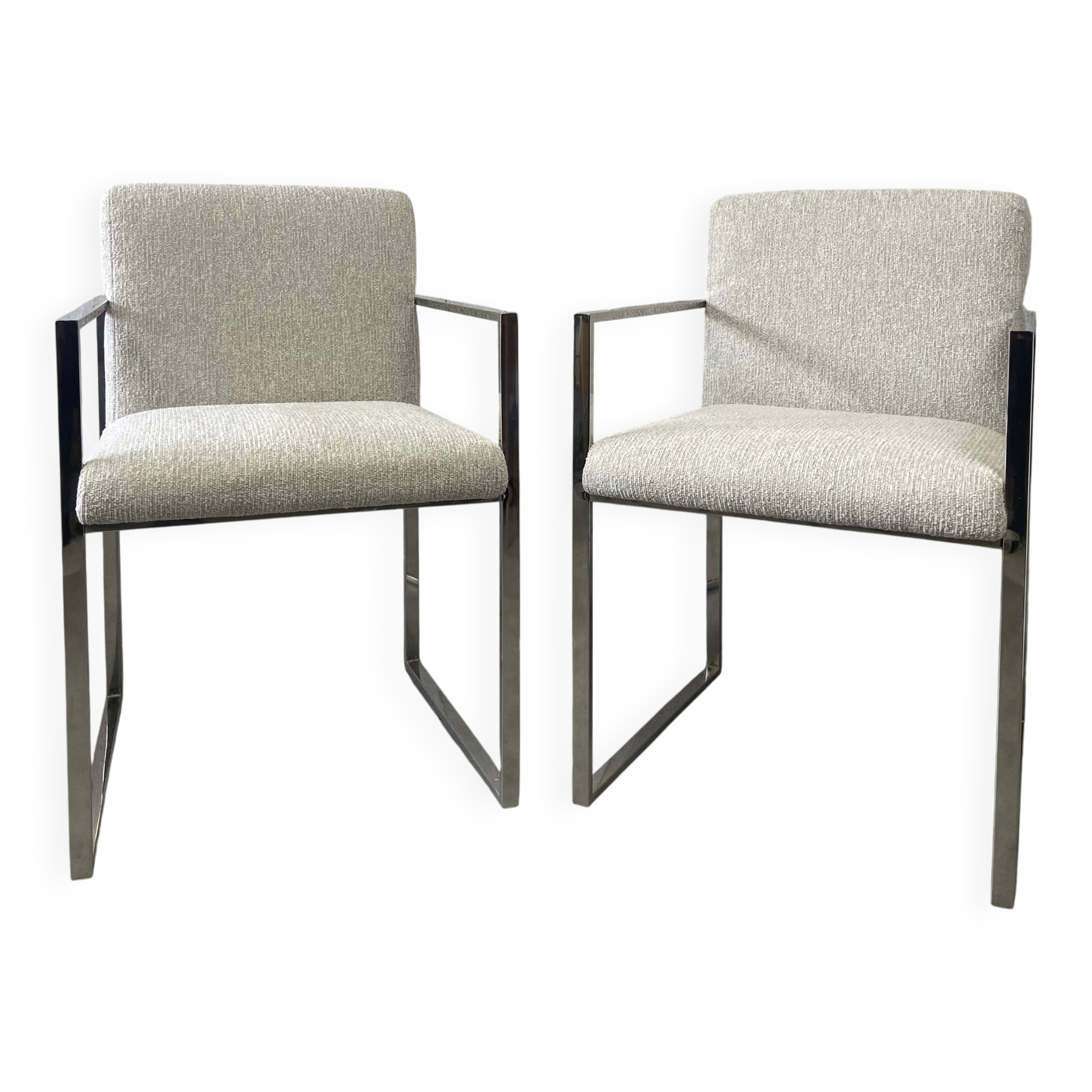 Pair of stainless steel armchairs from the 70s
