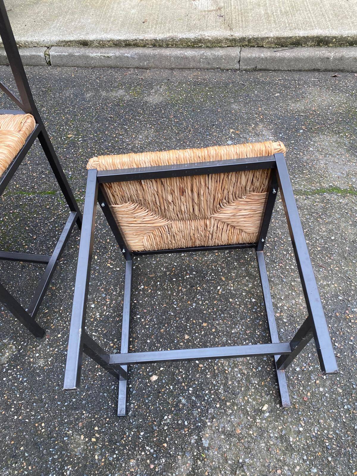2 Scandinavian chairs with black steel and straw from IKEA Granas.