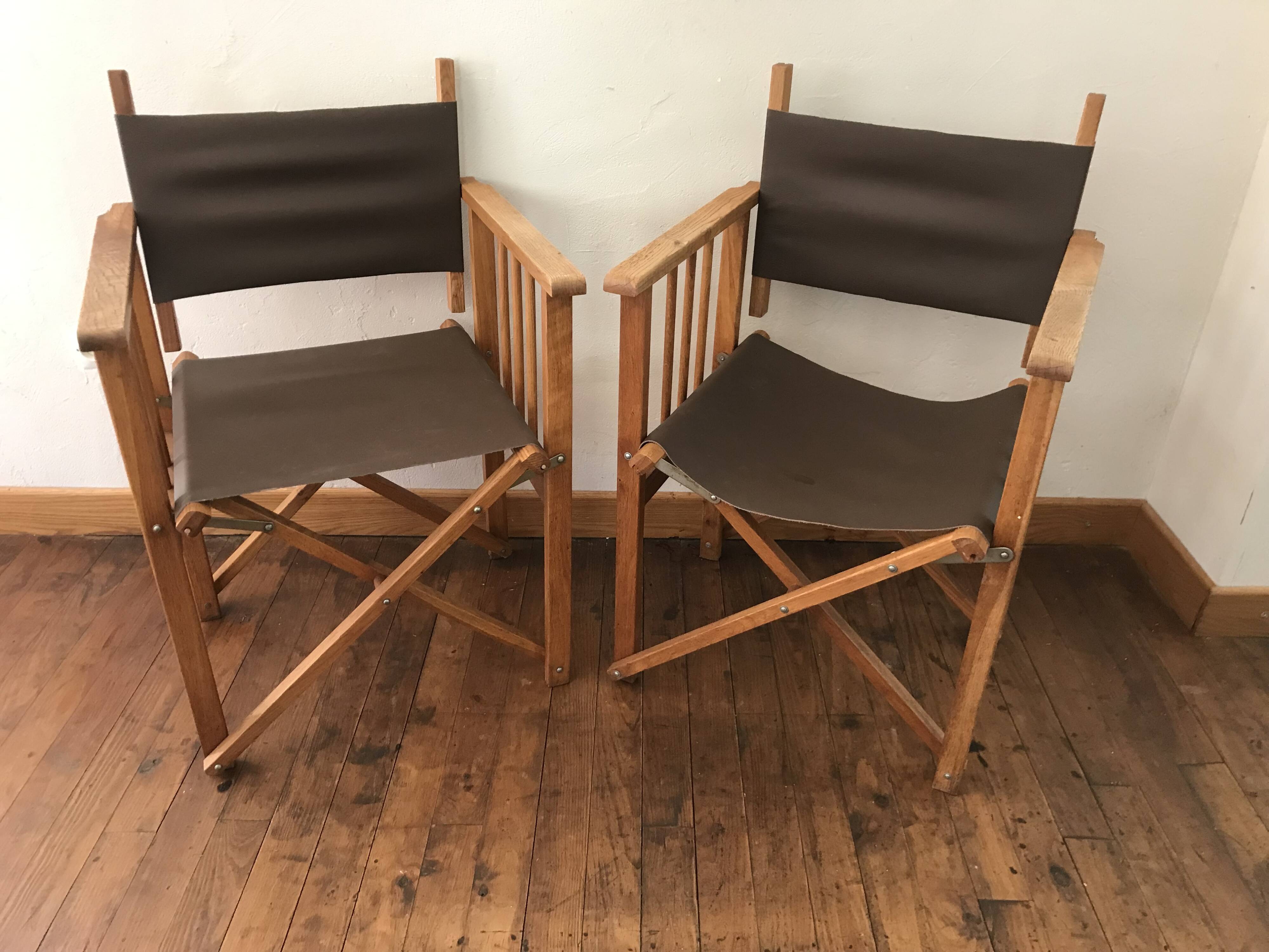 pair of Safari armchairs in wood and leather