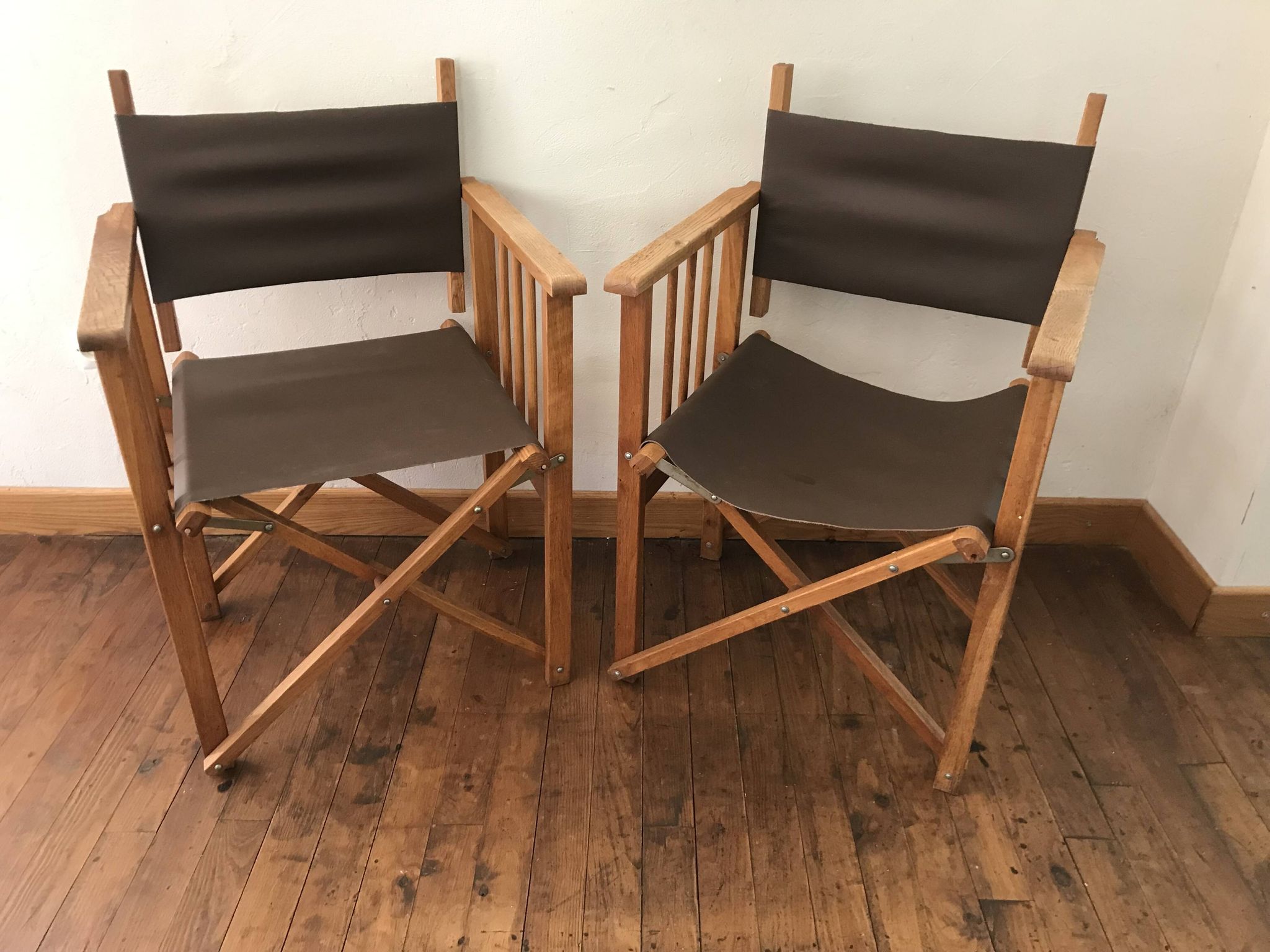 pair of Safari armchairs in wood and leather