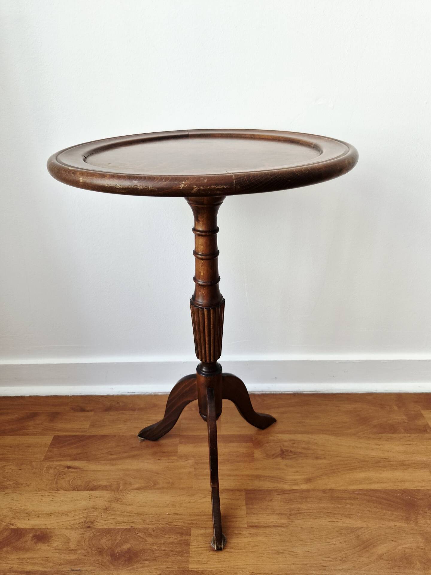 Small tripod wooden table with a vintage round top -