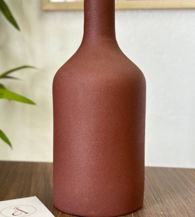 Iridescent brown bottle vase