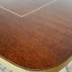 Table basse vintage en bois laqué et métal doré