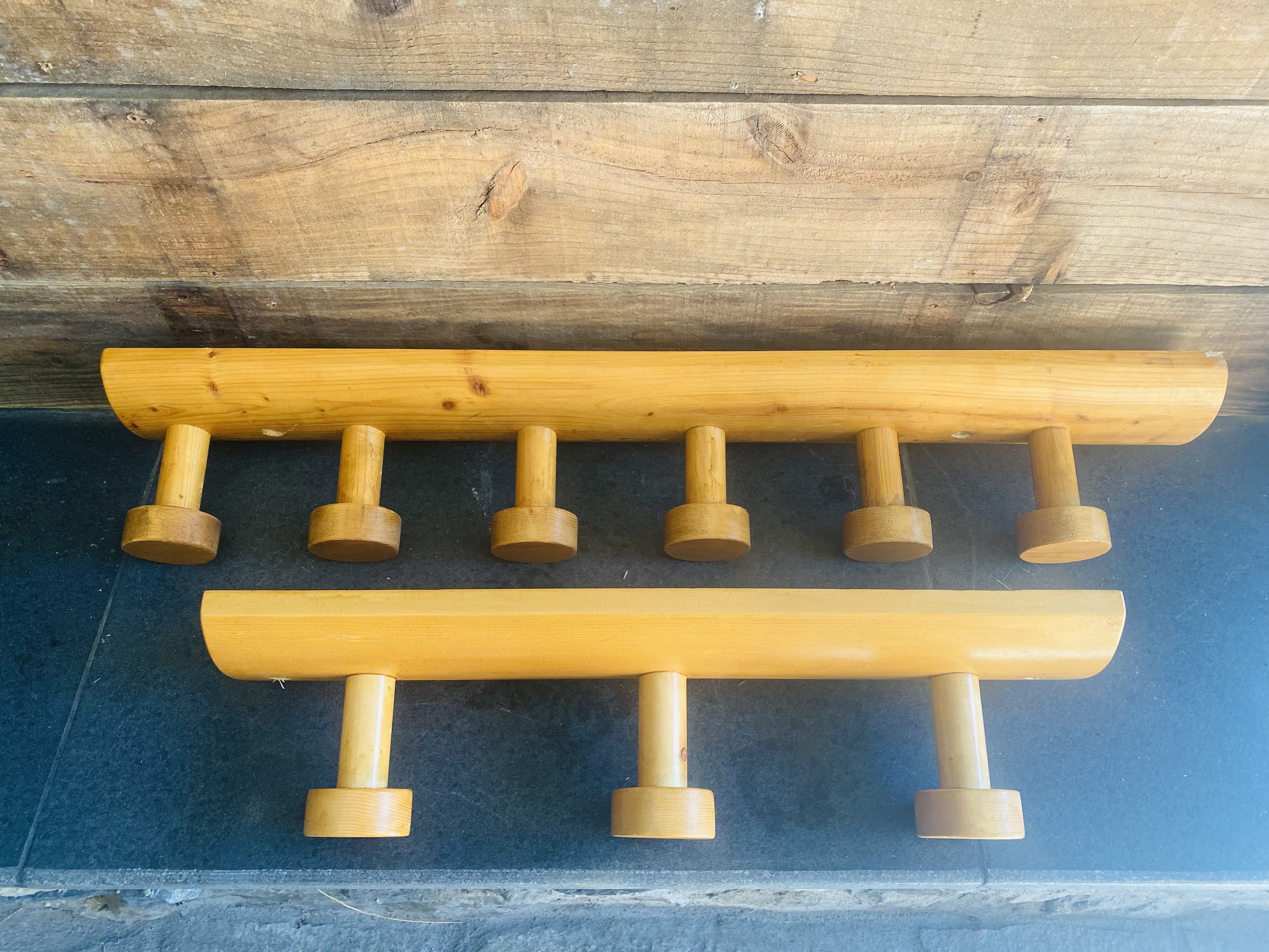 Set of two wooden pateres 60s in the Perriand style.