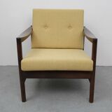 Fauteuil noyer en jaune années 1960