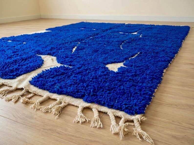Handmade pure wool rug with blue patterns, 150/250 cm.
