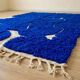 Handmade pure wool rug with blue patterns, 150/250 cm.
