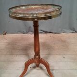 Gueridon dessu marble