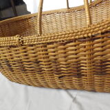 Old infant wicker basket