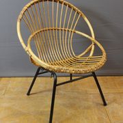 Living room in rattan and black lacquered iron by Rohe Noordwole circa 1950