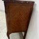 Transitional style commode with a protruding front, in marquetry wood, 20th century.