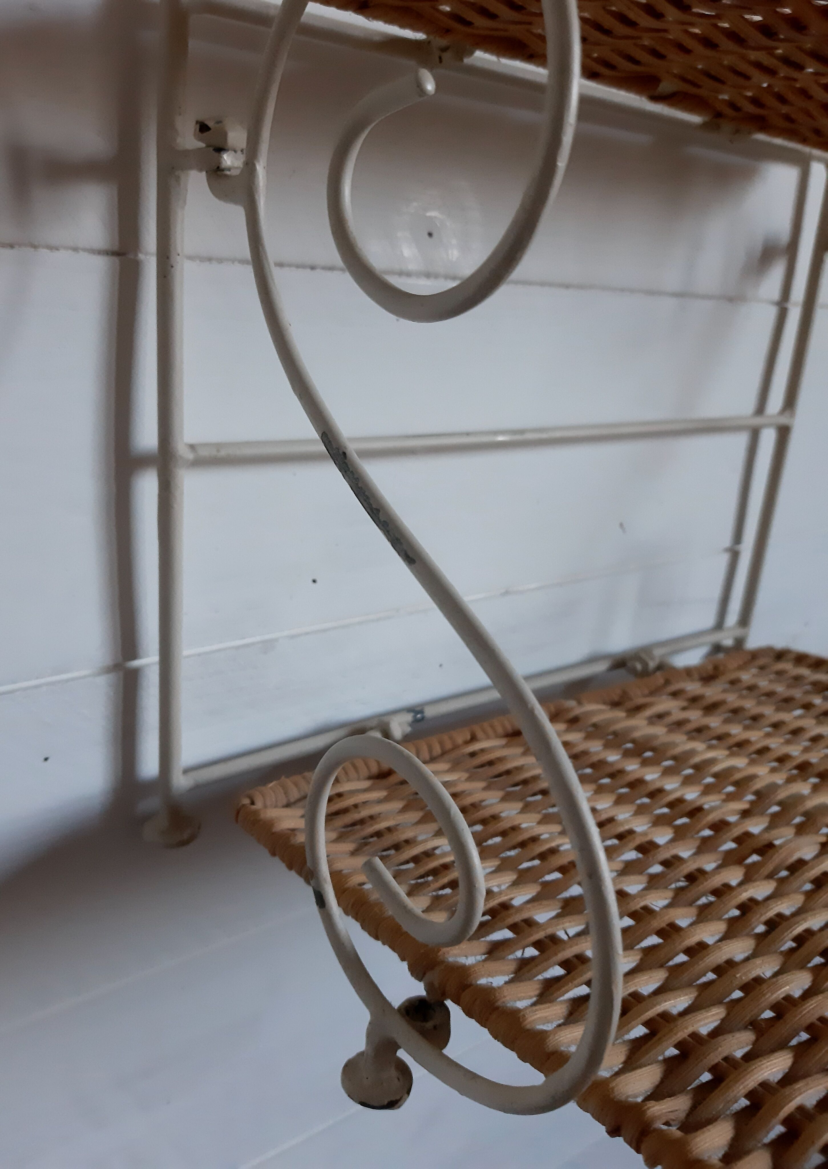 Rattan shelf and wrought iron