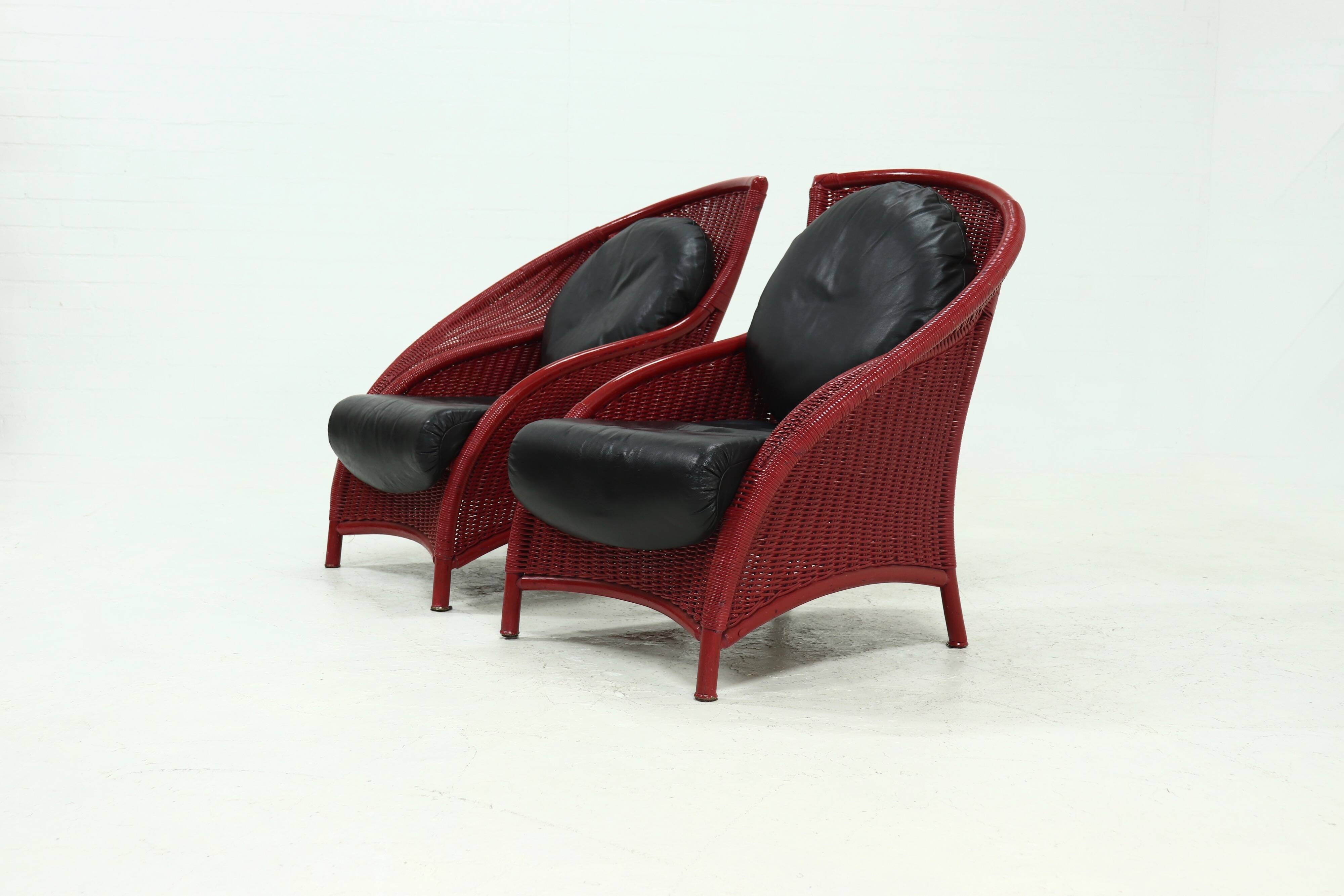 Set of 2 Sculptural Lounge Chairs in Red Lacquered Rattan 1970s