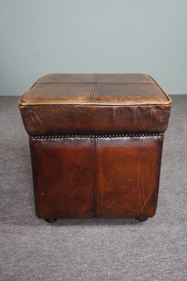 Armchair + sheepskin pouf