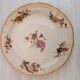 Set of porcelain dessert plates with flower patterns