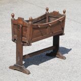 Antique cradle planter