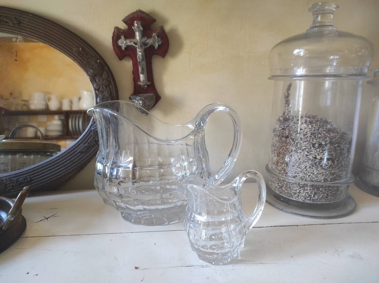 2 antique glass pitchers