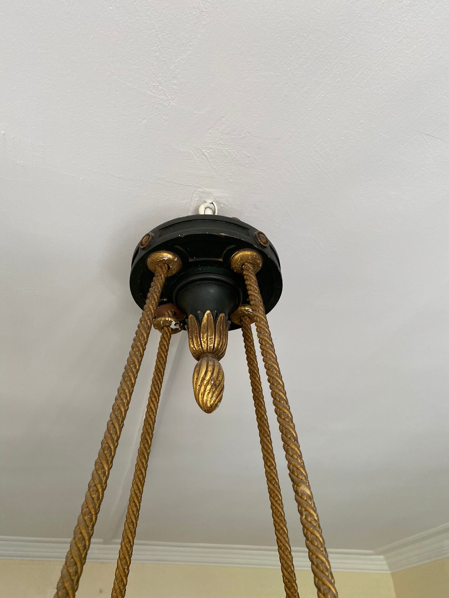 Empire style chandelier with four lights in sheet metal, bronze with patina and gilding