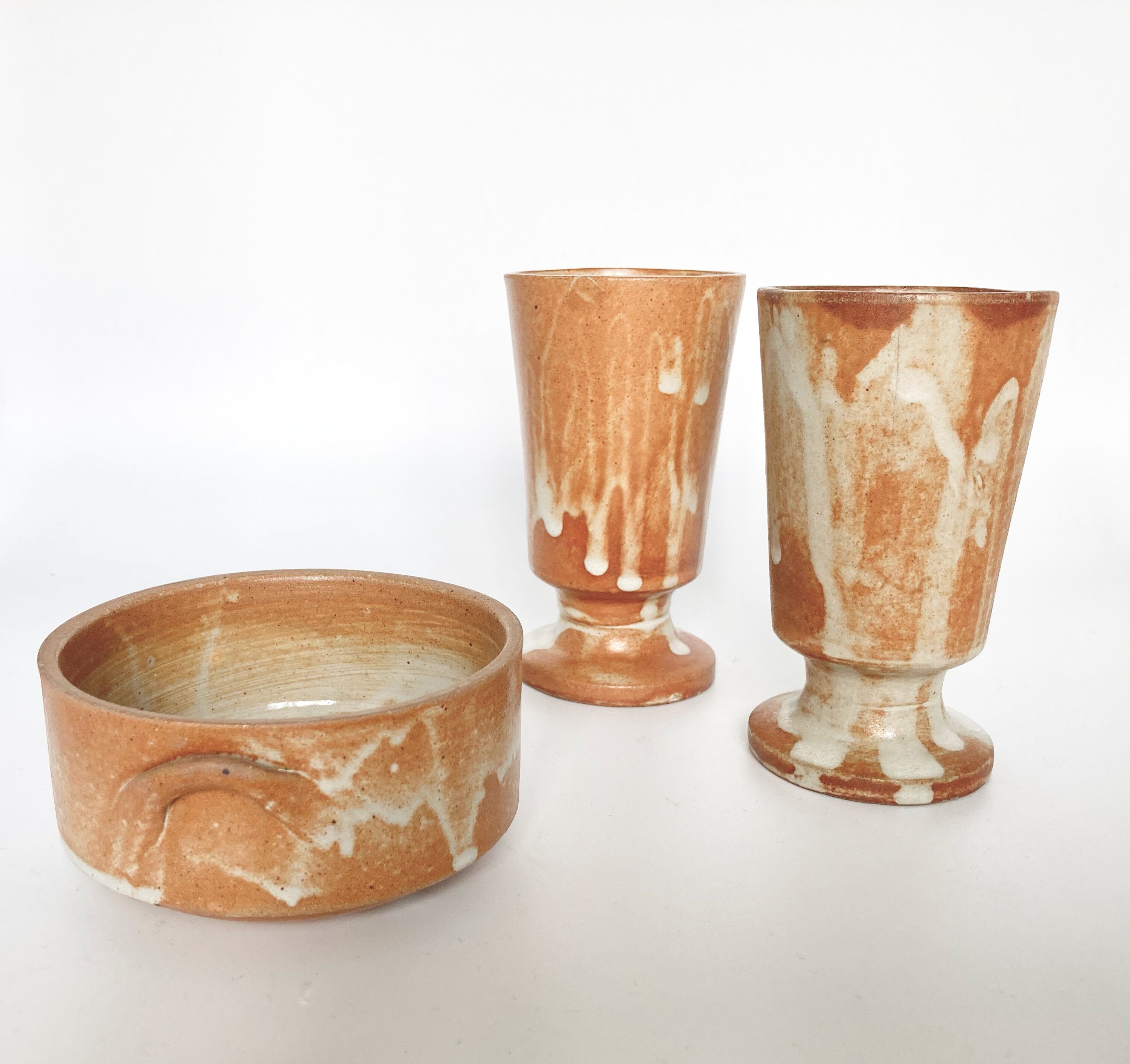 Two vintage stoneware cups and sugar bowl