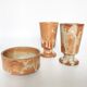 Two vintage stoneware cups and sugar bowl