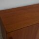 Modern mid-century teak sideboard with brass details.
