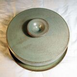 Sandstone cheese platter and bell