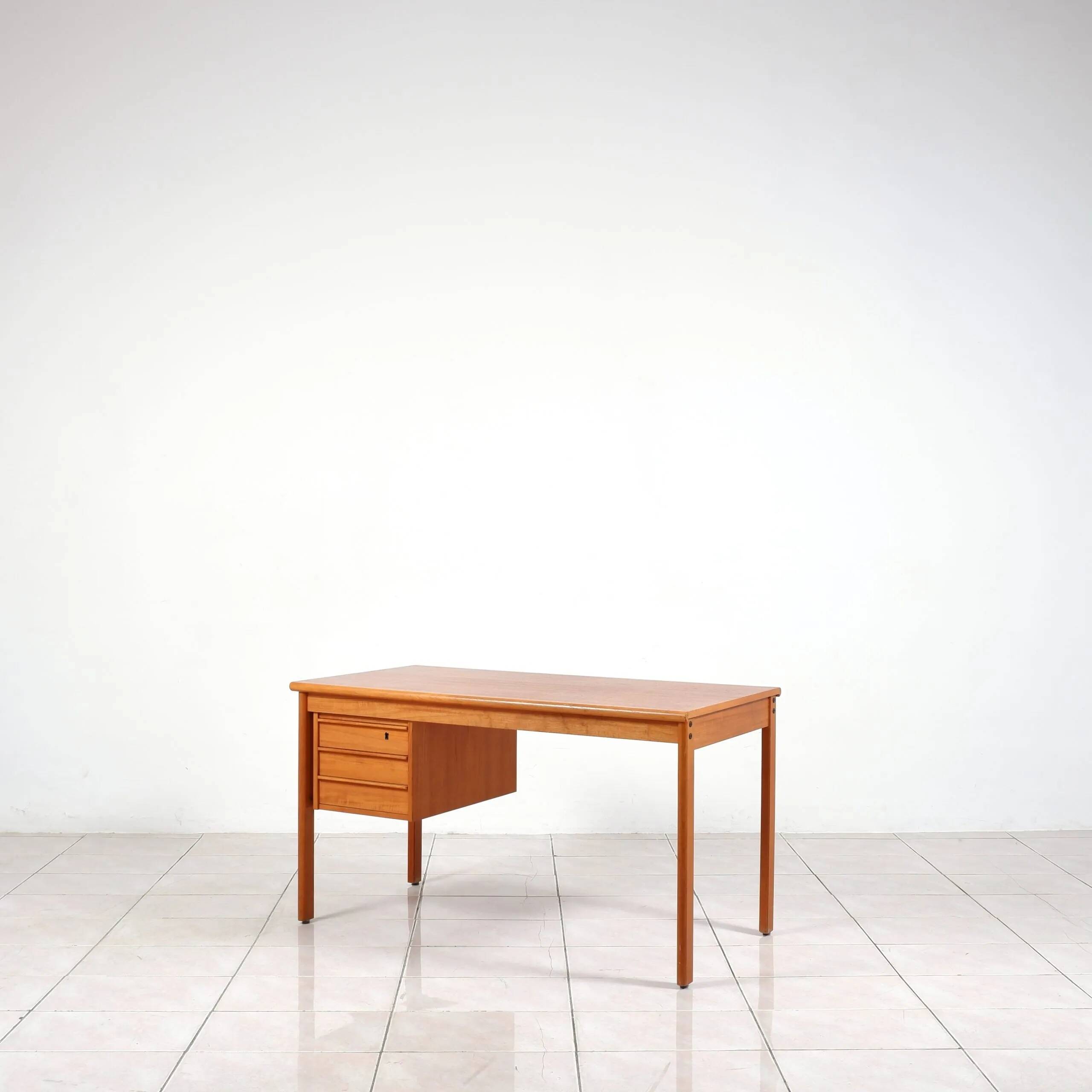 Teak writing desk by Peter Lovig Nielsen for Løvig